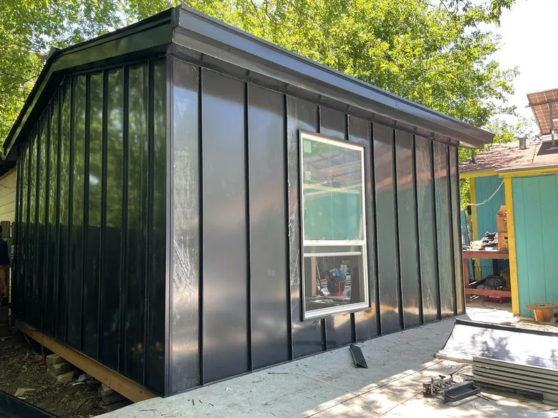 Black standing seam metal wall panels for Roof Inspection in Sherrelwood