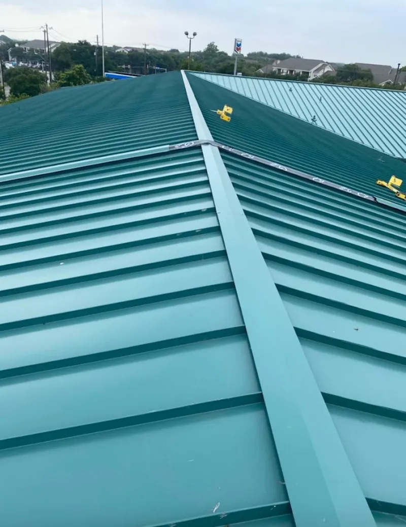 Green commercial metal roof ridge and valley for Metal Roof Repair in Sherrelwood